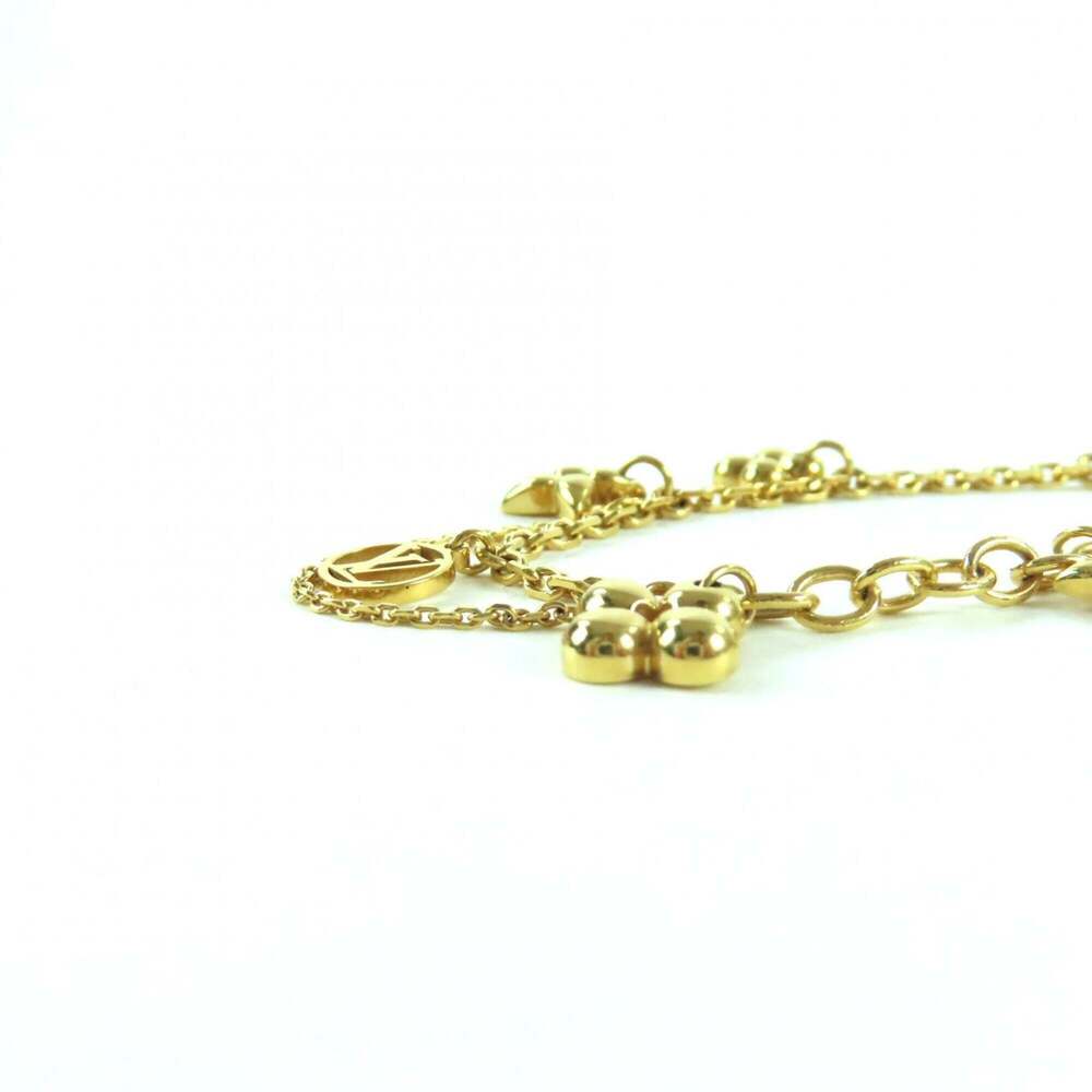 LOUIS VUITTON Gold Monogram Charm Bracelet - Picture 5 of 10